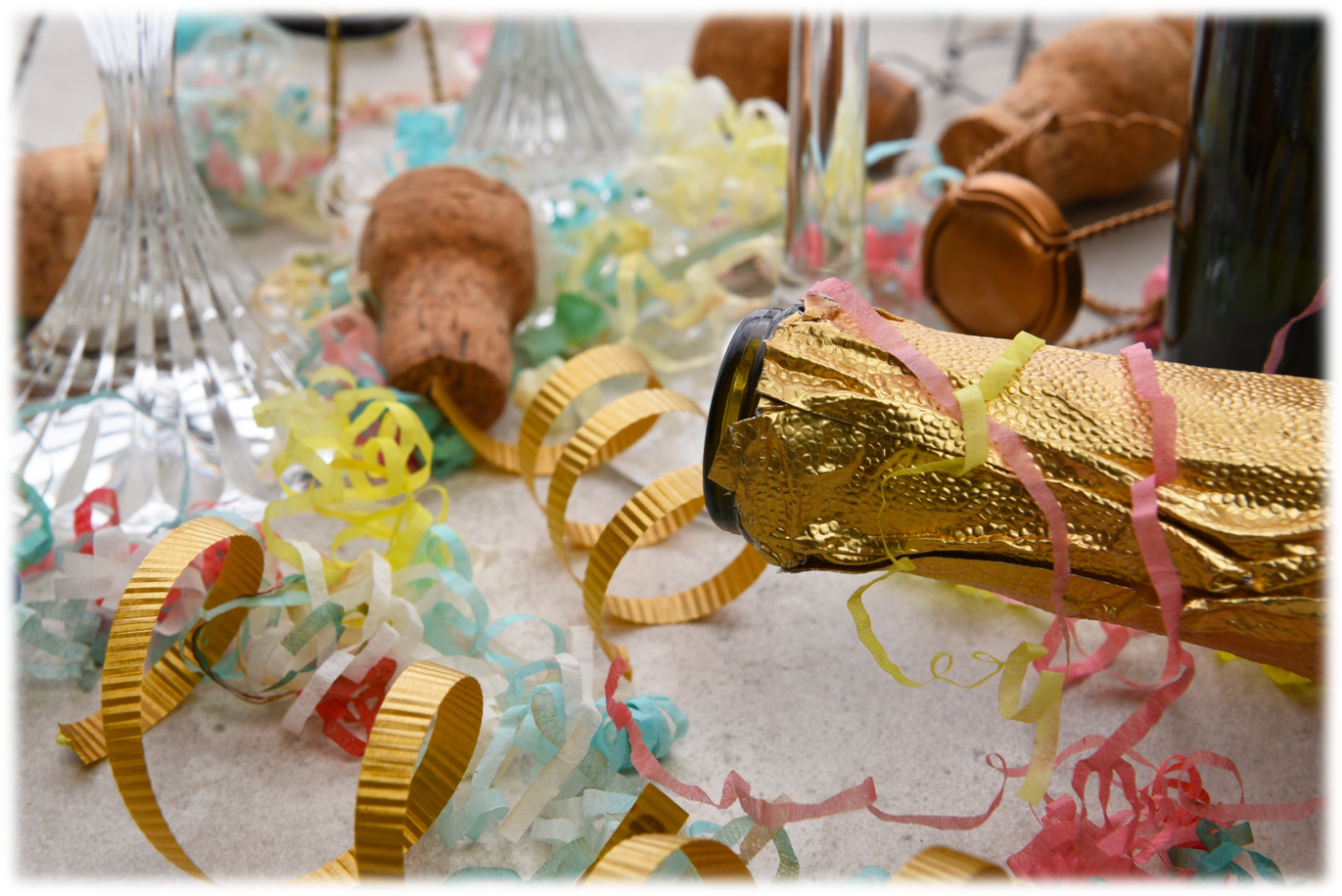 Link to New Year's Eve Safety - Bottle with corks and confetti on table